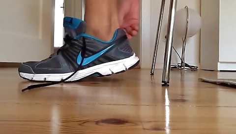 Sexy young brunette shows her black and feet